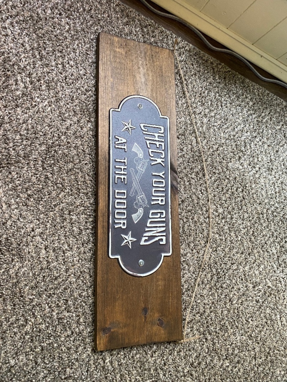 Handmade metal wooden sign “ old western saying “ check your guns at the  door”